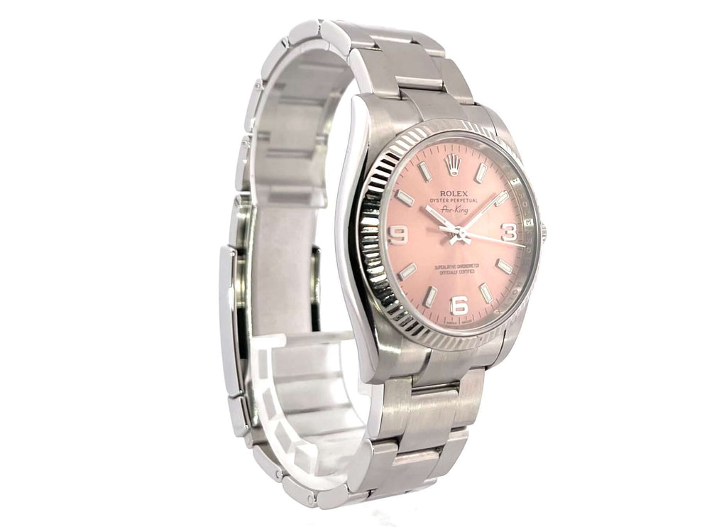 Rolex Air King Ref. 114234 mit rosa Zifferblatt und arabischen Ziffern, Edelstahlgehäuse, Weißgoldlünette, Oyster-Stahlarmband.