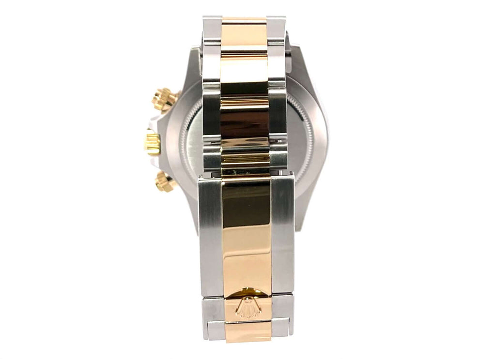 Rückseite der Rolex Daytona 116503 Edelstahl Gelbgold, Oyster Armband, gezeigt in poliertem und satiniertem Edelstahl mit 18 kt Gelbgold.