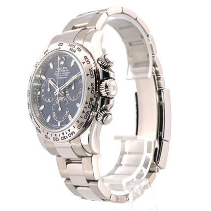 Rolex Cosmograph Daytona 116509 Weißgold 40 mm mit blauem Zifferblatt und Tachymeterskala, Armband aus 18 kt Weißgold.