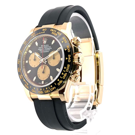 Rolex Cosmograph Daytona 116518LN Gelbgold, schwarzes Zifferblatt, Oysterflex-Armband, Champagnerfarbene Totalisatoren, 40 mm Gehäuse.