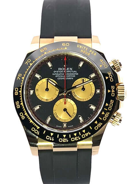 Rolex Daytona 116518LN aus Gelbgold, schwarzes Zifferblatt mit Champagner-Totalisatoren und schwarzes Oysterflex-Band