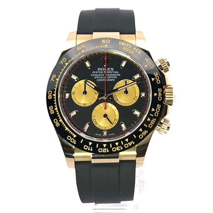 Rolex Daytona 116518LN in Gelbgold mit schwarzem Zifferblatt, Champagnerfarbene Totalisatoren und schwarzem Oysterflex-Band.