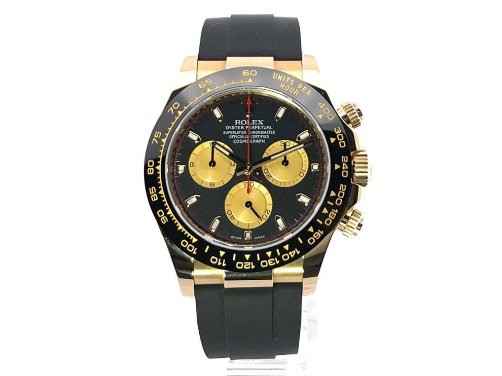 Rolex Daytona 116518LN in Gelbgold mit schwarzem Zifferblatt, Champagnerfarbene Totalisatoren und schwarzem Oysterflex-Band.