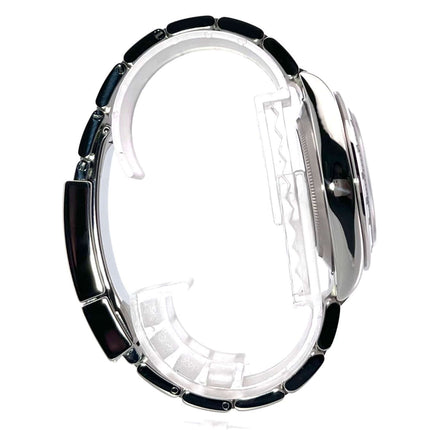 Seite des Rolex Daytona Edelstahl 116520 Weiß mit poliertem und satiniertem Edelstahlgehäuse und Armband, Tachymeterskala.