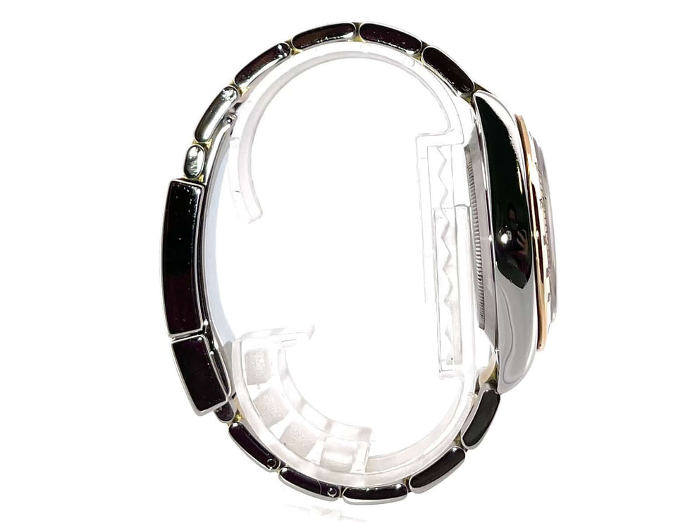 Rolex Daytona Cosmograph 116523 Stahlgrau Seitenansicht des Edelstahl und Gelbgold Armbands mit polierter Lünette.