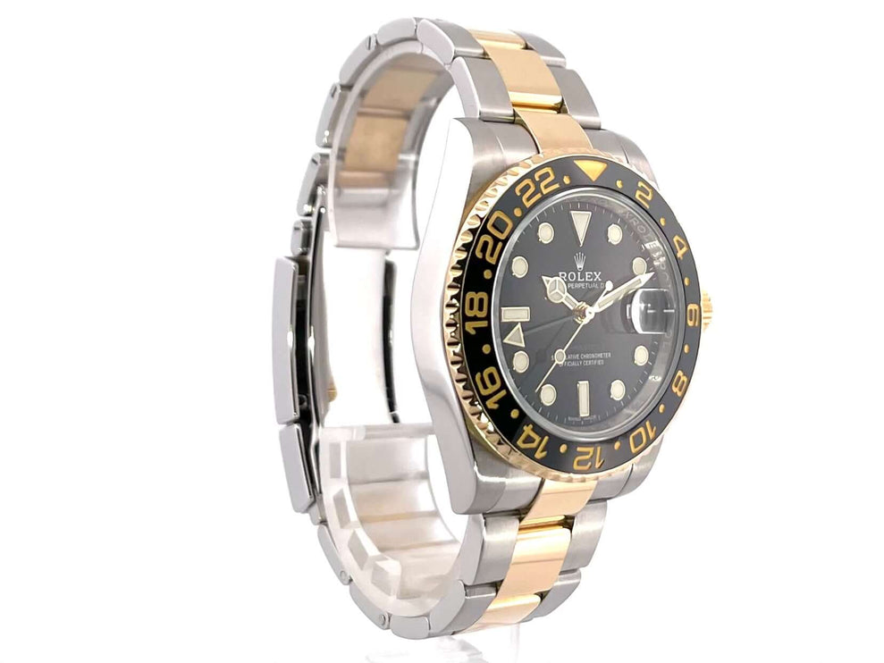 Rolex GMT-Master II 116713LN Uhr Edelstahl und Gelbgold, schwarzes Zifferblatt, 18 kt geriffelte Lünette, Oyster Armband, 40 mm Gehäusedurchmesser
