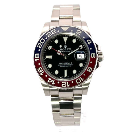Rolex GMT-Master II Weißgold 116719BLRO Uhr mit schwarzem Zifferblatt, blau/roter Keramik-Lünette und poliertem 18 kt Weißgold-Gehäuse.