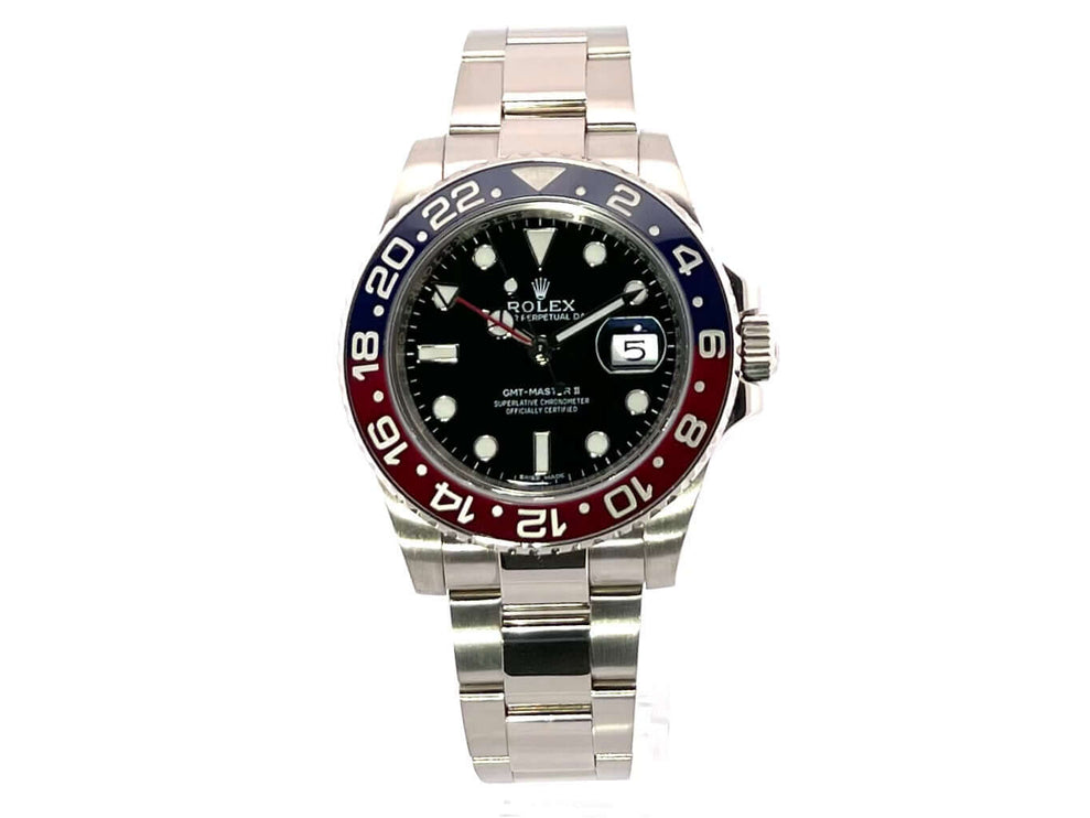 Rolex GMT-Master II Weißgold 116719BLRO Uhr mit schwarzem Zifferblatt, blau/roter Keramik-Lünette und poliertem 18 kt Weißgold-Gehäuse.