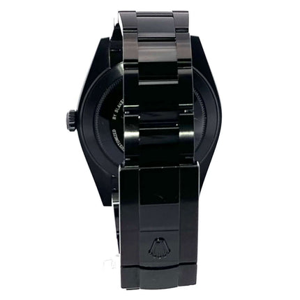 Rückseite der Rolex Datejust 41 Oystersteel 126300 mit schwarzem Oyster-Band und Faltschließe, poliertes Edelstahlgehäuse.