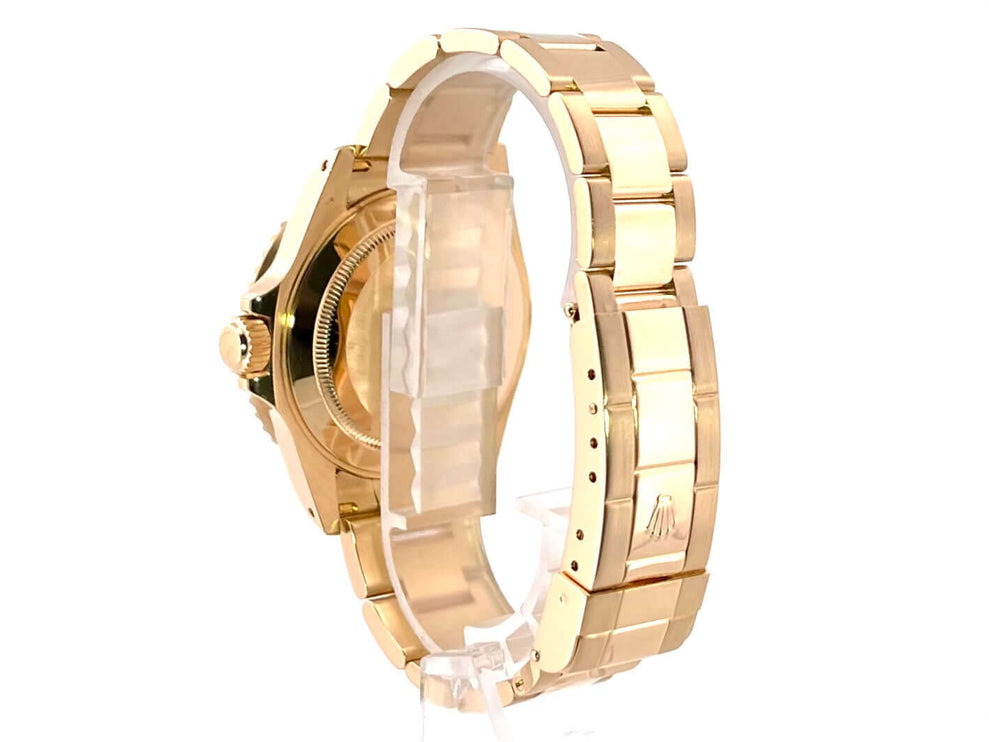 Rückansicht des Rolex Submariner Date Ref. 16618 Gelbgold mit 18 Karat gelbgoldenem Oyster-Armband und poliertem/satinierten Gehäuse.