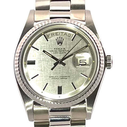 Rolex Day-Date 36 Uhr Weißgold 1803, silbernes Zifferblatt mit Leuchtindizes, geriffelte Lünette, Präsident Armband