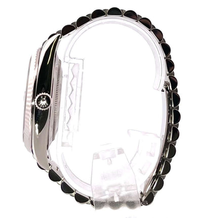 Seitenansicht der Rolex Day-Date 40 Weißgold 228239 mit poliertem Weißgoldgehäuse und Präsident Armband