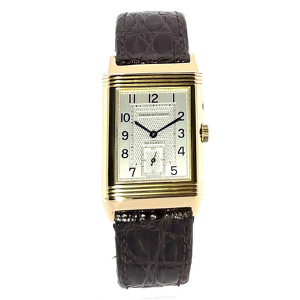 Jaeger-LeCoultre Reverso 270.140.544 Herrenarmbanduhr aus 18 kt Gelbgold mit braunem Alligatorlederarmband und Dornschließe, silbernes Zifferblatt