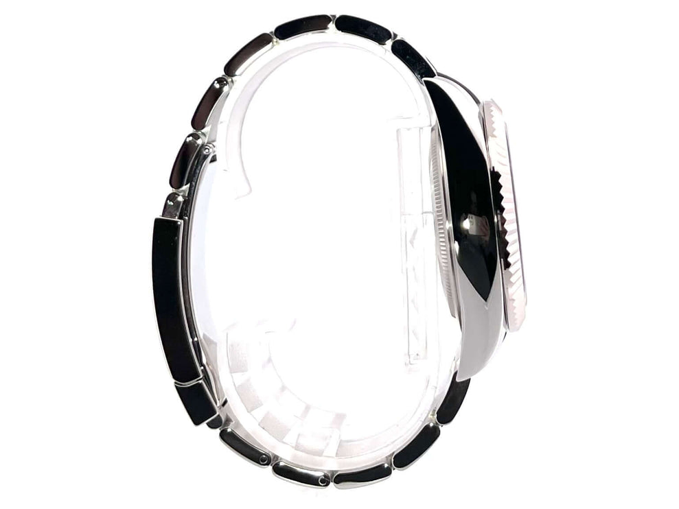 Seitenansicht Rolex Sky-Dweller Edelstahl Weißgold 326934 blaues Zifferblatt, poliertes und satiniertes Oyster-Armband, 42 mm Gehäuse.