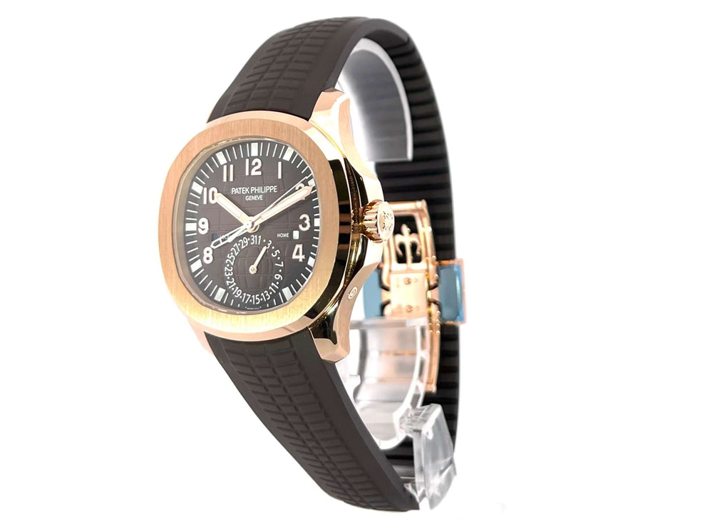 Patek Philippe Aquanaut Travel Time 5164R-001 Roségold Uhr mit braunem Kautschukband und schokobraunem Zifferblatt.