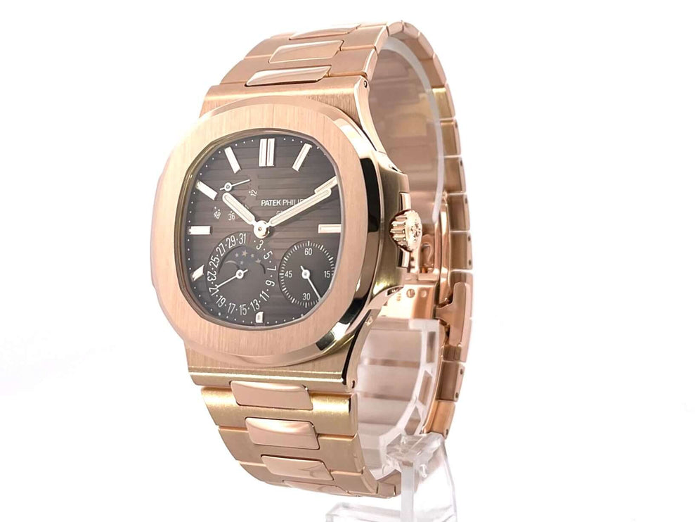 Patek Philippe Nautilus 5712/1R-001 in Roségold mit poliertem 18 kt Gehäuse und Armband, braunes Zifferblatt, Automatikaufzug.