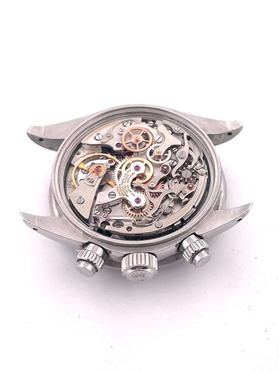 Mechanismus einer Rolex Daytona Edelstahl 6263, Uhrwerk-Details, klassische Handaufzug-Funktion, fein bearbeitete Zahnräder