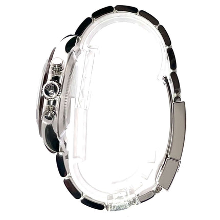 Seitenansicht Rolex Daytona Platin 116506 mit poliertem und satiniertem Platinarmband und verschraubter Krone.