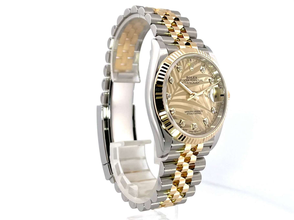 Rolex Datejust 36 126233 mit goldenem Palmenmuster und Diamant-Jubilé-Band aus Edelstahl und Gelbgold.
