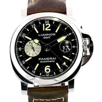 Panerai Luminor GMT Automatik Acciaio PAM01088, 44 mm Edelstahlgehäuse, schwarzes Zifferblatt, braunes Lederband, fluoreszierende Ziffern.